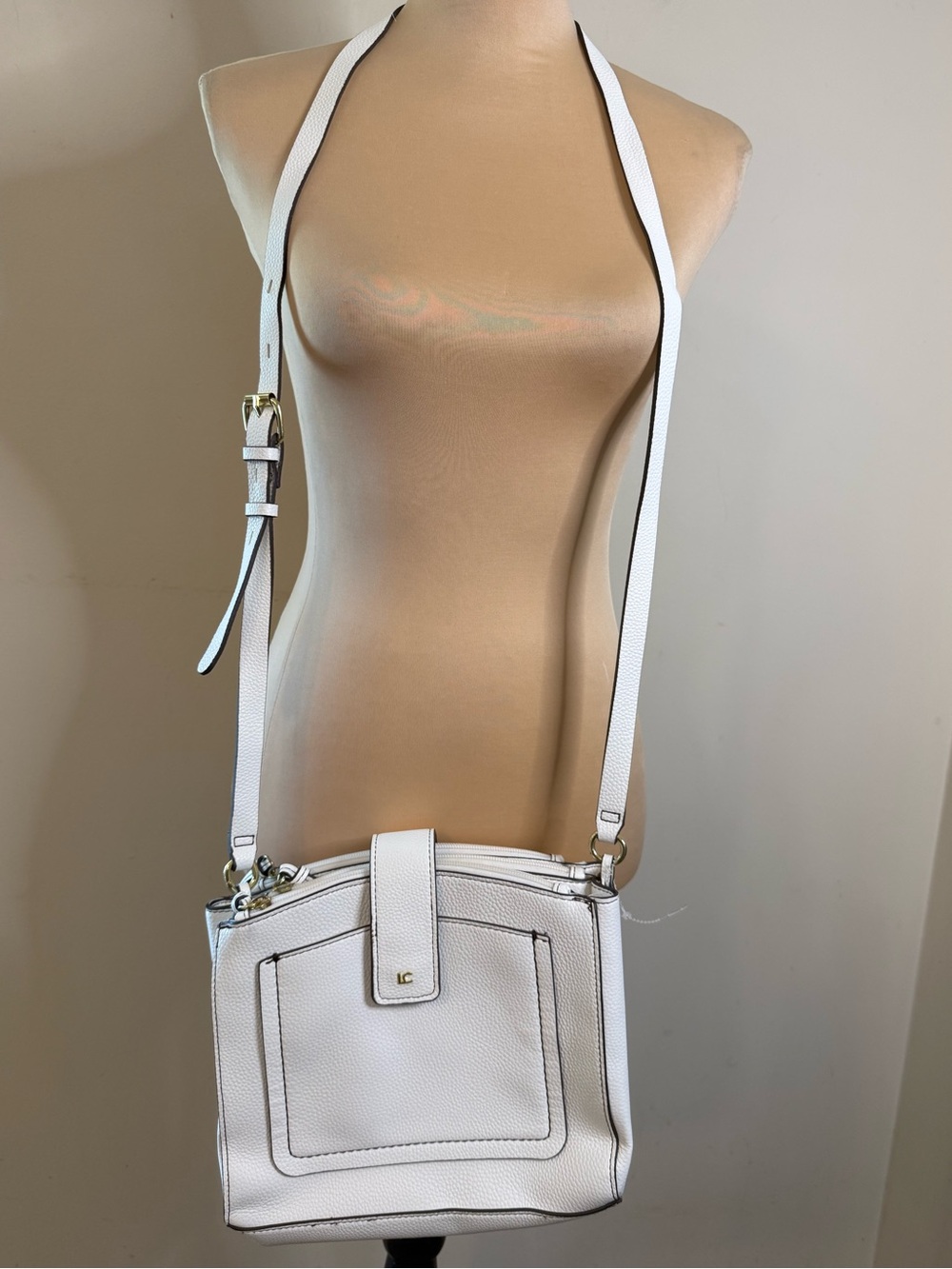 Liz Claiborne white multi zip pocket shoulder bag white fabric interior.